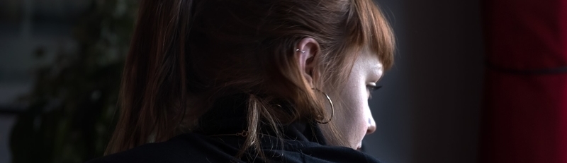 A woman looking over her shoulder