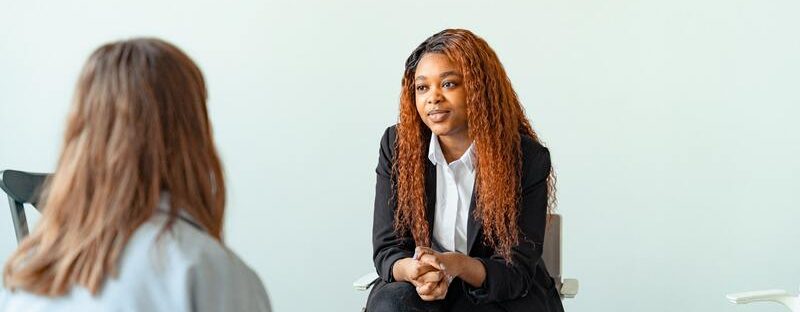 Woman counselling a classy client